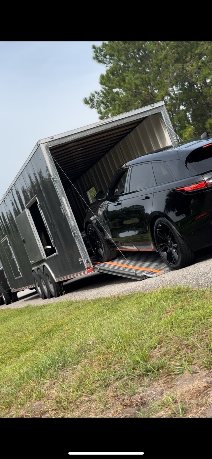 Cars getting in truck